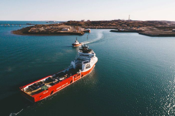 An aerial shot of an LNG tanker off the Pilbara coast approaching the port.