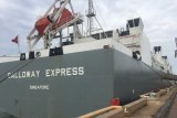 a livestock vessel docks at a port